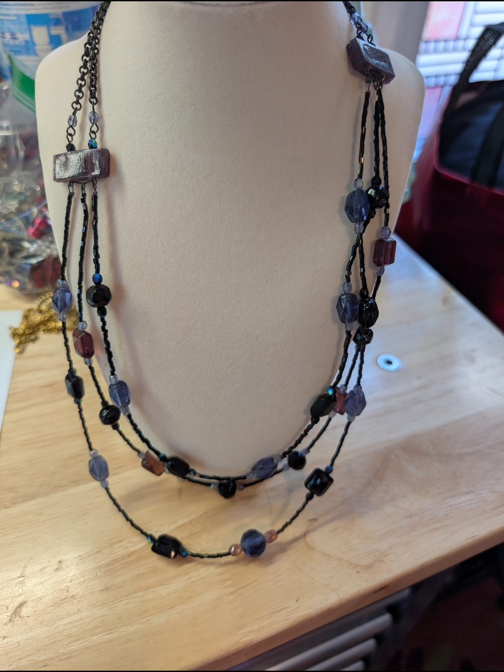 Multi-Strand Black Beaded Necklace with Purple and Brown Accents